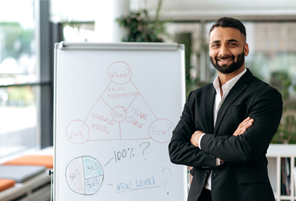 Man standing in front of chart